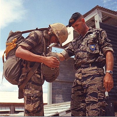 [Advisors] SSG. Coy, 503rd Mobile Strike Force, 5th Special Forces Group, (ABN), gives parachuting instructions. Nha Trang, 14th October 1967